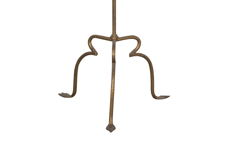 20th Century tall stylish Spanish gilt metal floor lamp with inverted trumpet form to the ringed stem.