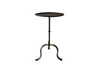 Spanish, gilt iron cocktail table with hammered and rope rim top on hammered ringed stem and decoratively shaped tripod base.