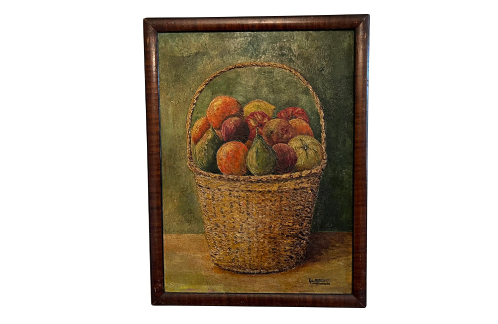 Vintage oil painting of a large basket of fruit signed Robert Malinceoni