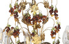 20th Century chandelier with bunched of glass grape drops and brass vine leaves.&nbsp;