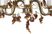 20th Century chandelier with bunched of glass grape drops and brass vine leaves.&nbsp;