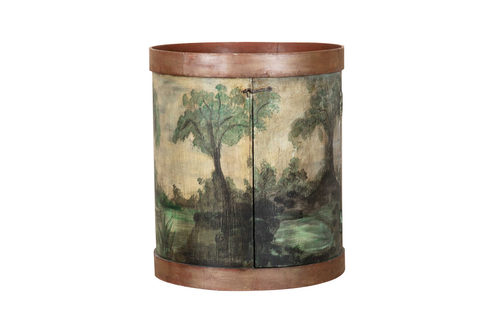 A charming 20th Century French decorative drum cupboard