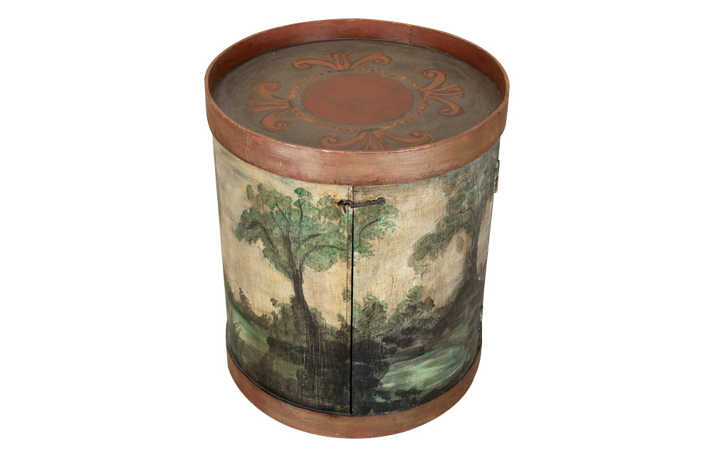 A charming 20th Century French decorative drum cupboard