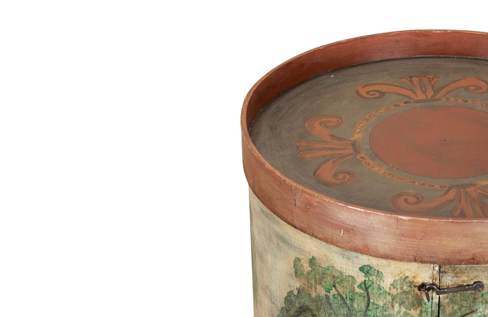 A charming 20th Century French decorative drum cupboard