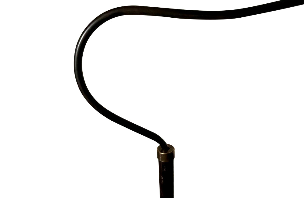 20th Century French neoclassical revival telescopic iron and brass floor lamp with adjustable bulb holder.