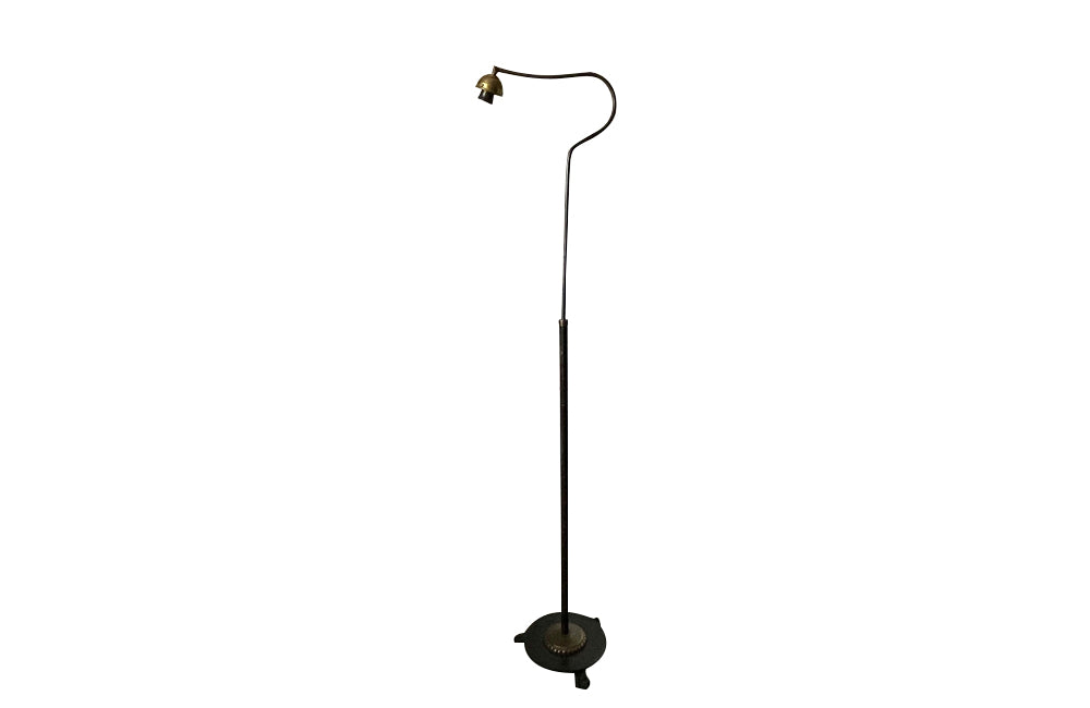 20th Century French neoclassical revival telescopic iron and brass floor lamp with adjustable bulb holder.