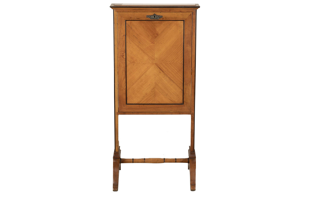 A refined mid-20th Century French folding secrétaire in cherrywood.