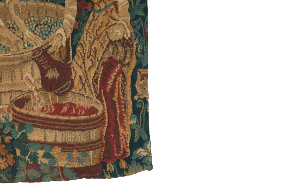 Antique tapestry wall hanging titled 'Le Pressage depicting wine pressing in XV Century Medieval times. French antiques