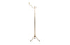 Mid century floor lamp French Classical style in brass with upper finial and ringed stem. Mid century lighting