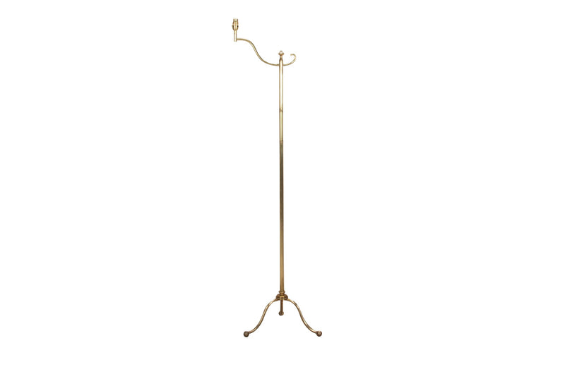 Mid century floor lamp French Classical style in brass with upper finial and ringed stem. Mid century lighting