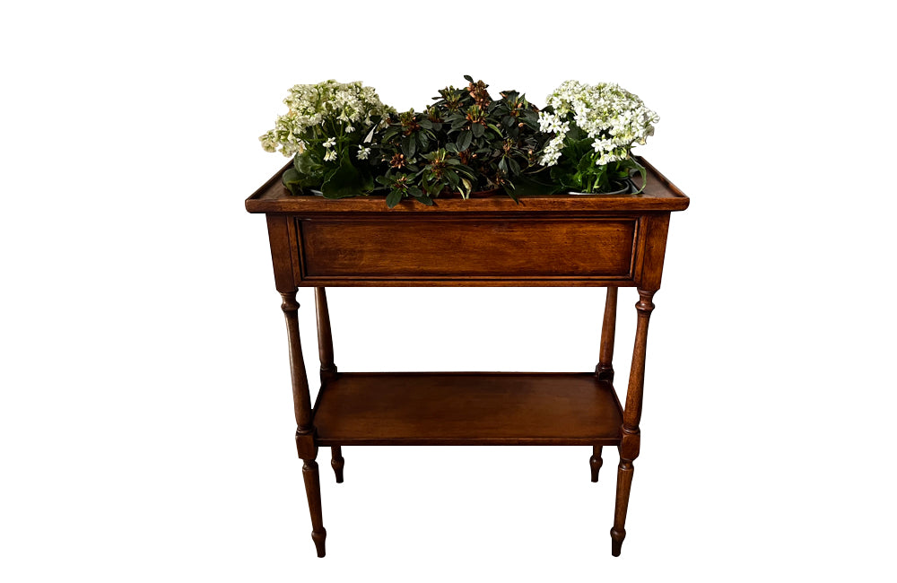 Elegant, Louis XVI Revival cherry wood jardiniere with zinc liner.