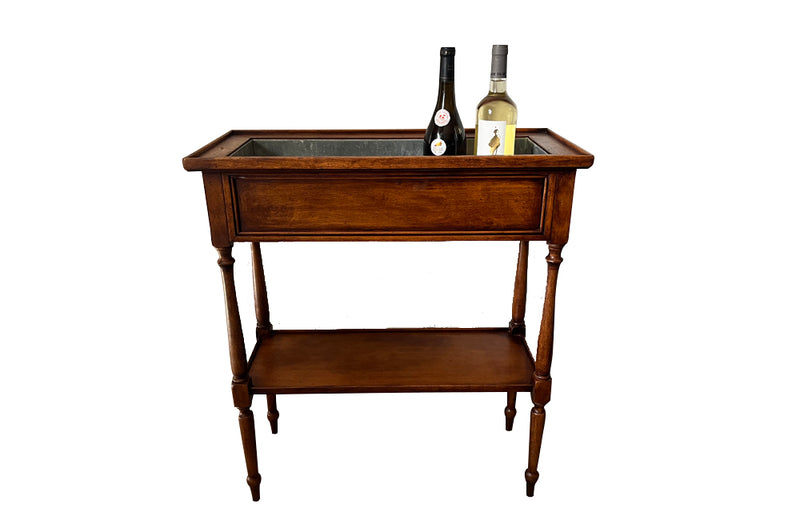 Elegant, Louis XVI Revival cherry wood jardiniere with zinc liner.