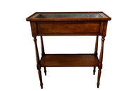 Elegant, Louis XVI Revival cherry wood jardiniere with zinc liner.