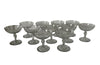 Beautiful set of 11 French champagne coupes decorated with a neo-classical etched design featuring galands of flowers.  c.1900