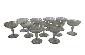 Beautiful set of 11 French champagne coupes decorated with a neo-classical etched design featuring galands of flowers.  c.1900
