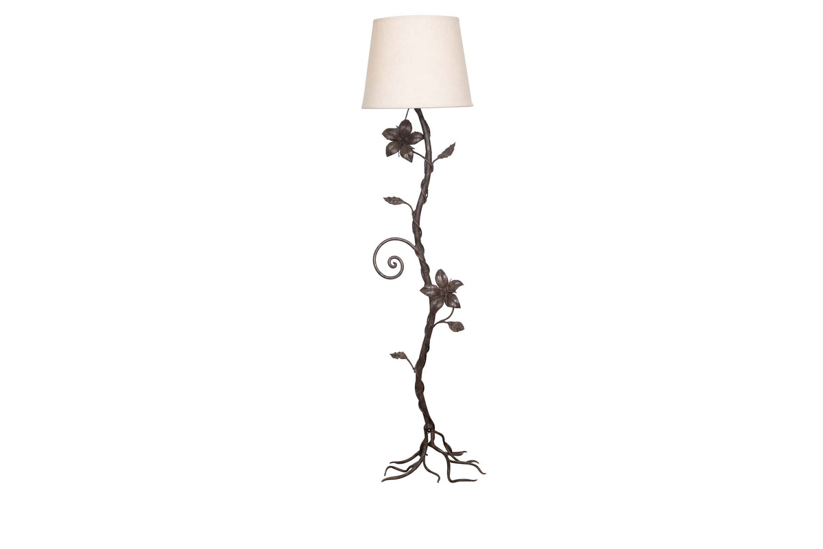 decorative wrought iron floor lamp in the form of a climbing flowering plant