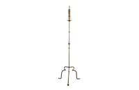 20th Century tall stylish Spanish gilt metal floor lamp with inverted trumpet form to the ringed stem.