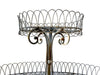 Antique metal plant stand made of iron work with three tiers