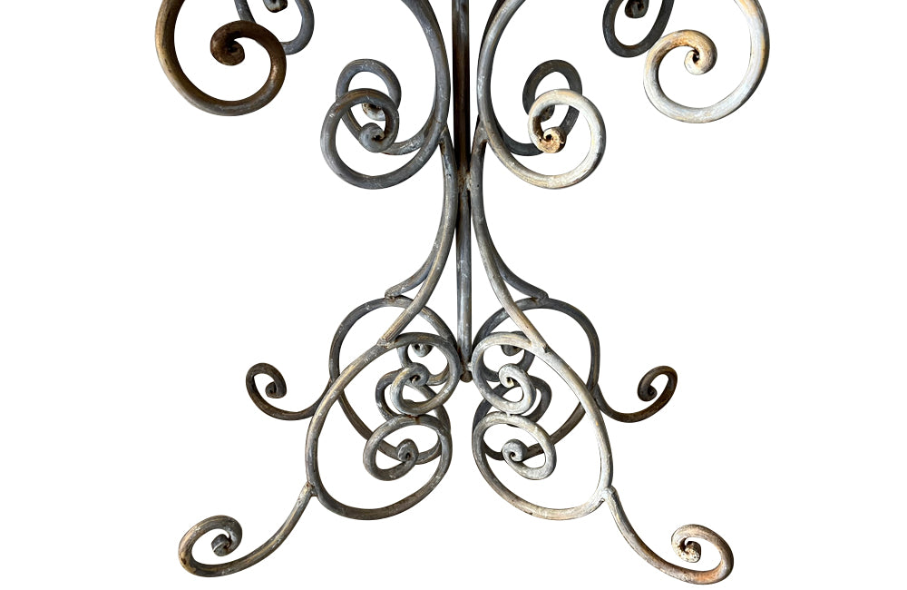 Large French iron wirework florists plant stand with three tiers.