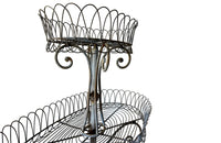 Large French iron wirework florists plant stand with three tiers.