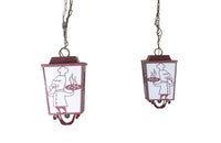 Pair of 20th century iron lanterns from an Italian restaurant.