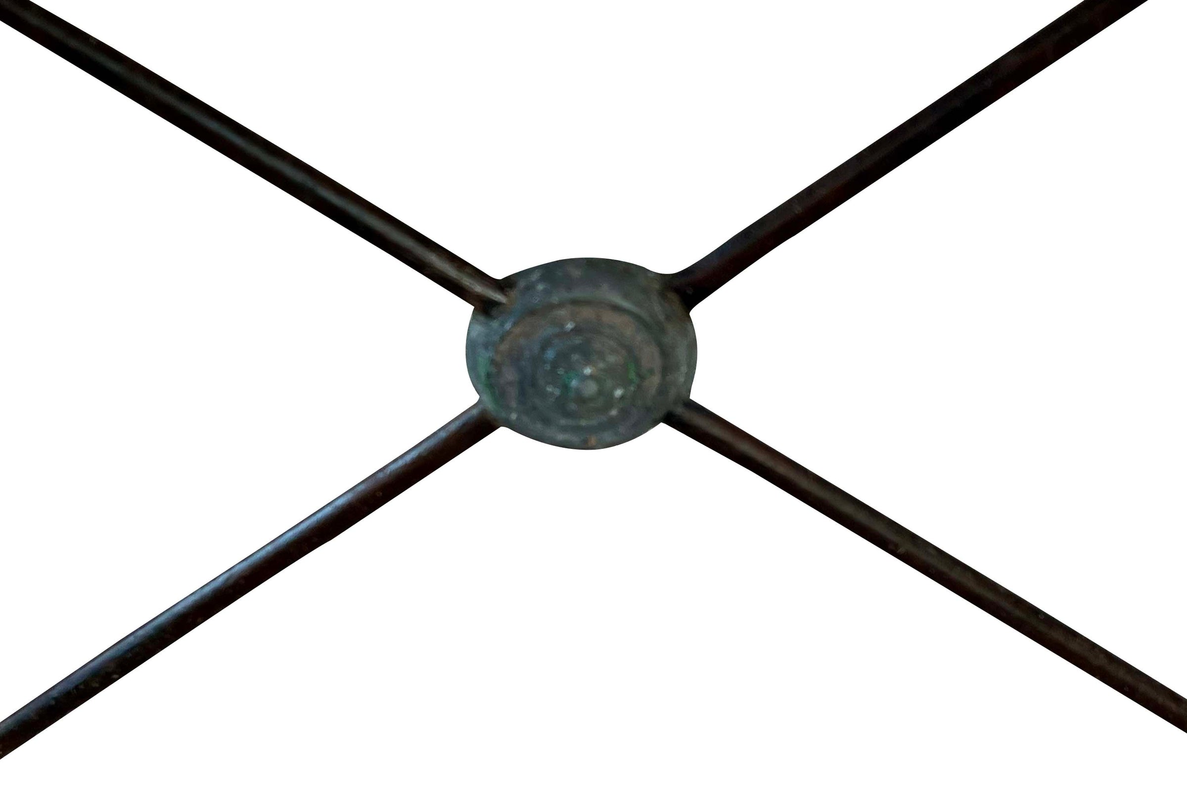Beautiful, near pair of large 19th Century French iron tables with oval marble tops.
