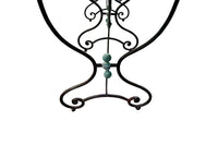 Beautiful, near pair of large 19th Century French iron tables with oval marble tops.