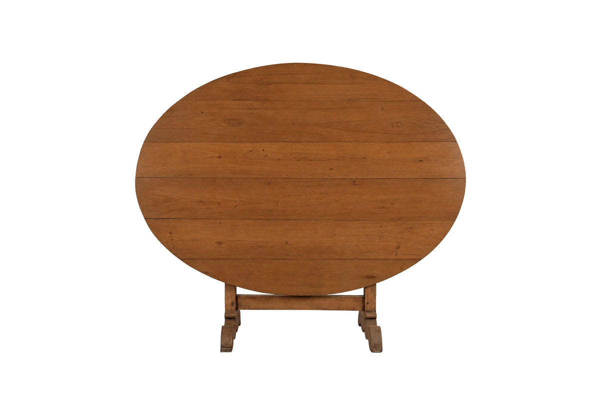 An elegant 19th Century French vigneron table crafted from solid cherry.