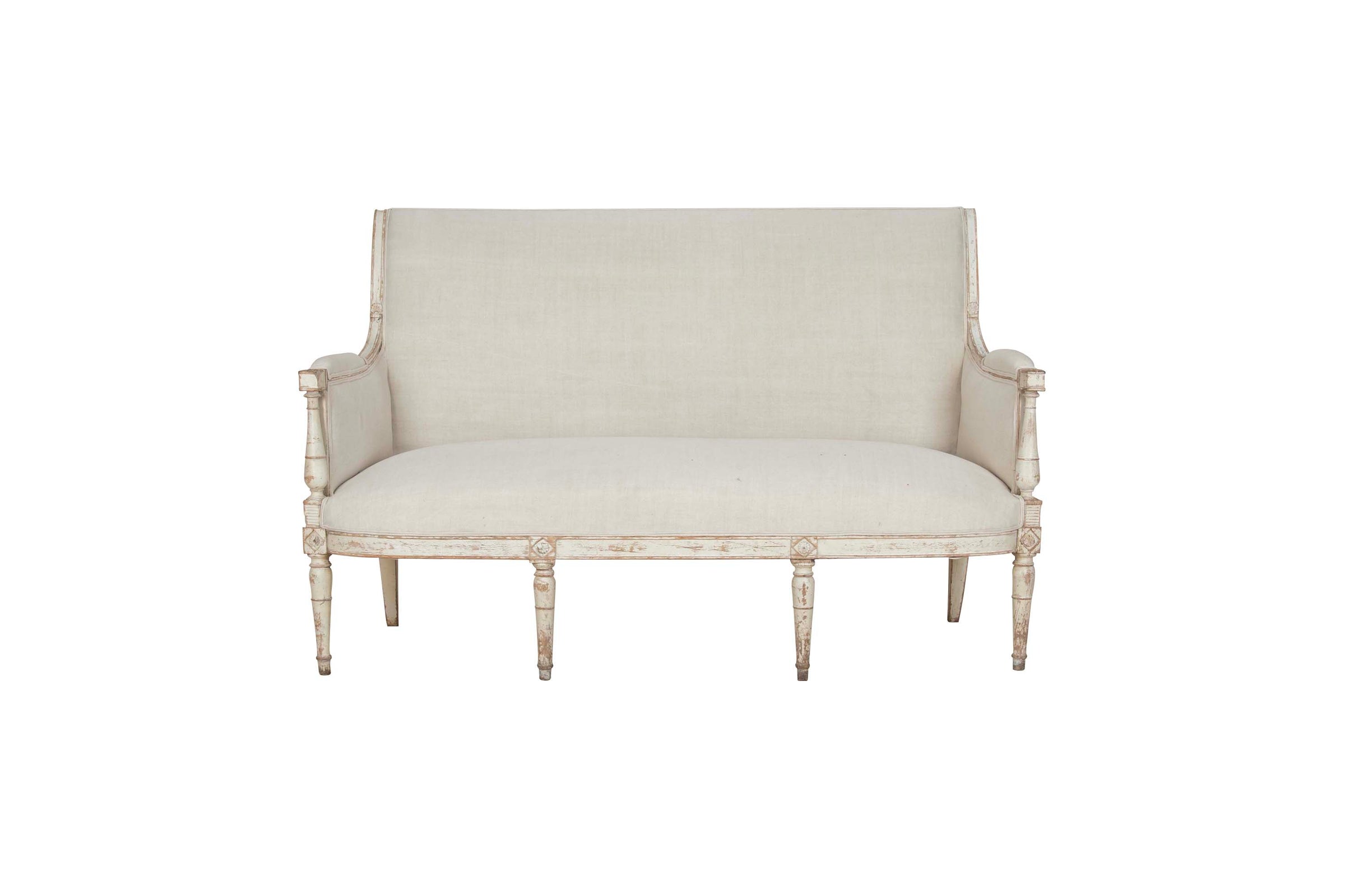 Early 19th century Directoire period French sofa upholstered in antique linen