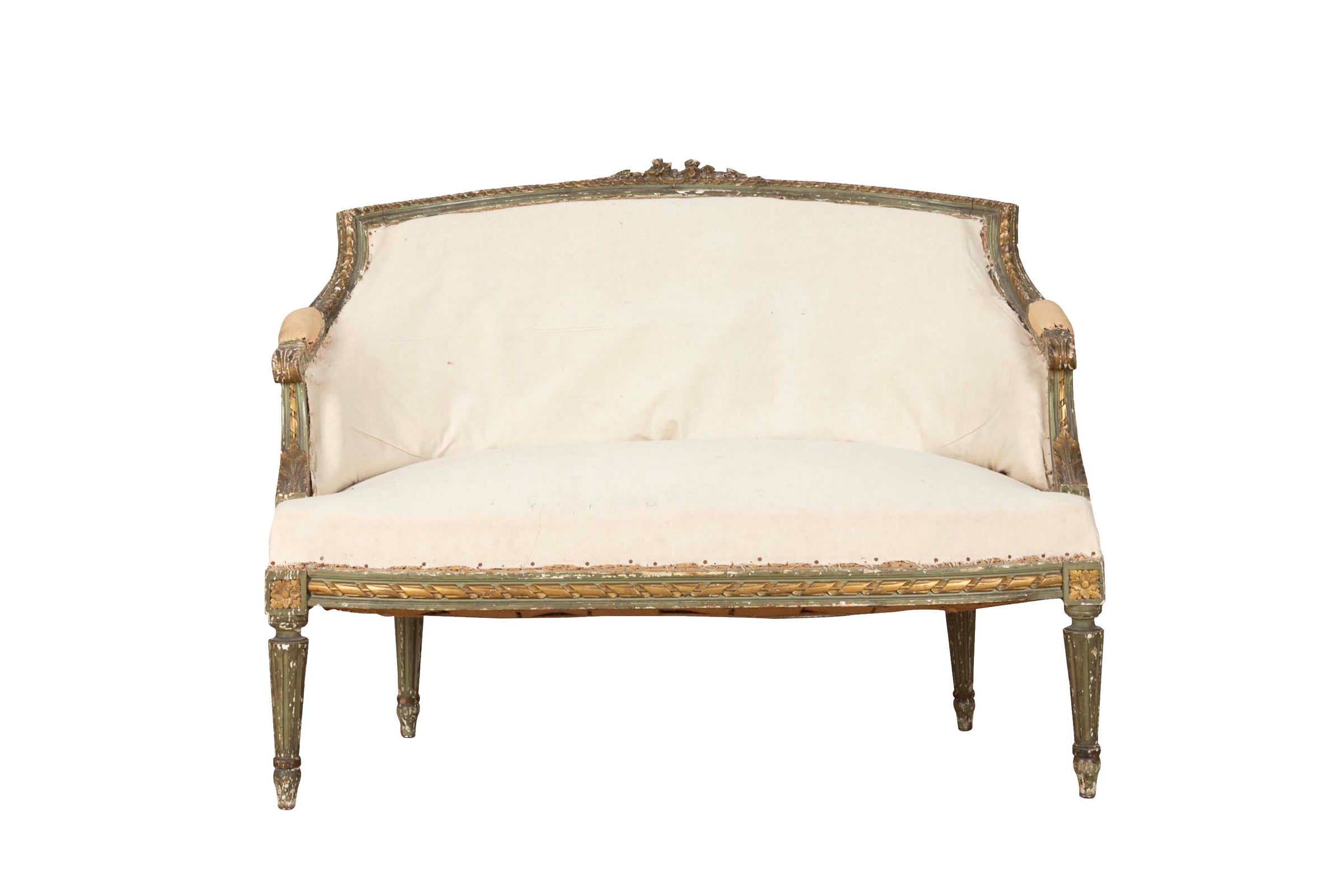 A refined petite 19th Century French sofa in the Louis XVI style.