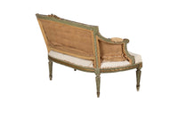 A refined petite 19th Century French sofa in the Louis XVI style.