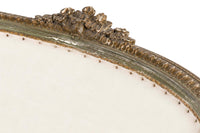 A refined petite 19th Century French sofa in the Louis XVI style.