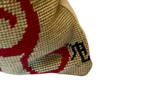 Mid-Century French wool needlepoint cushion featuring a striking stylised dragon or phoenix in red, black, cream, and golden tones.
