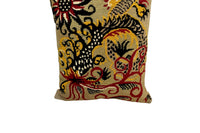 Mid-Century French wool needlepoint cushion featuring a striking stylised dragon or phoenix in red, black, cream, and golden tones.