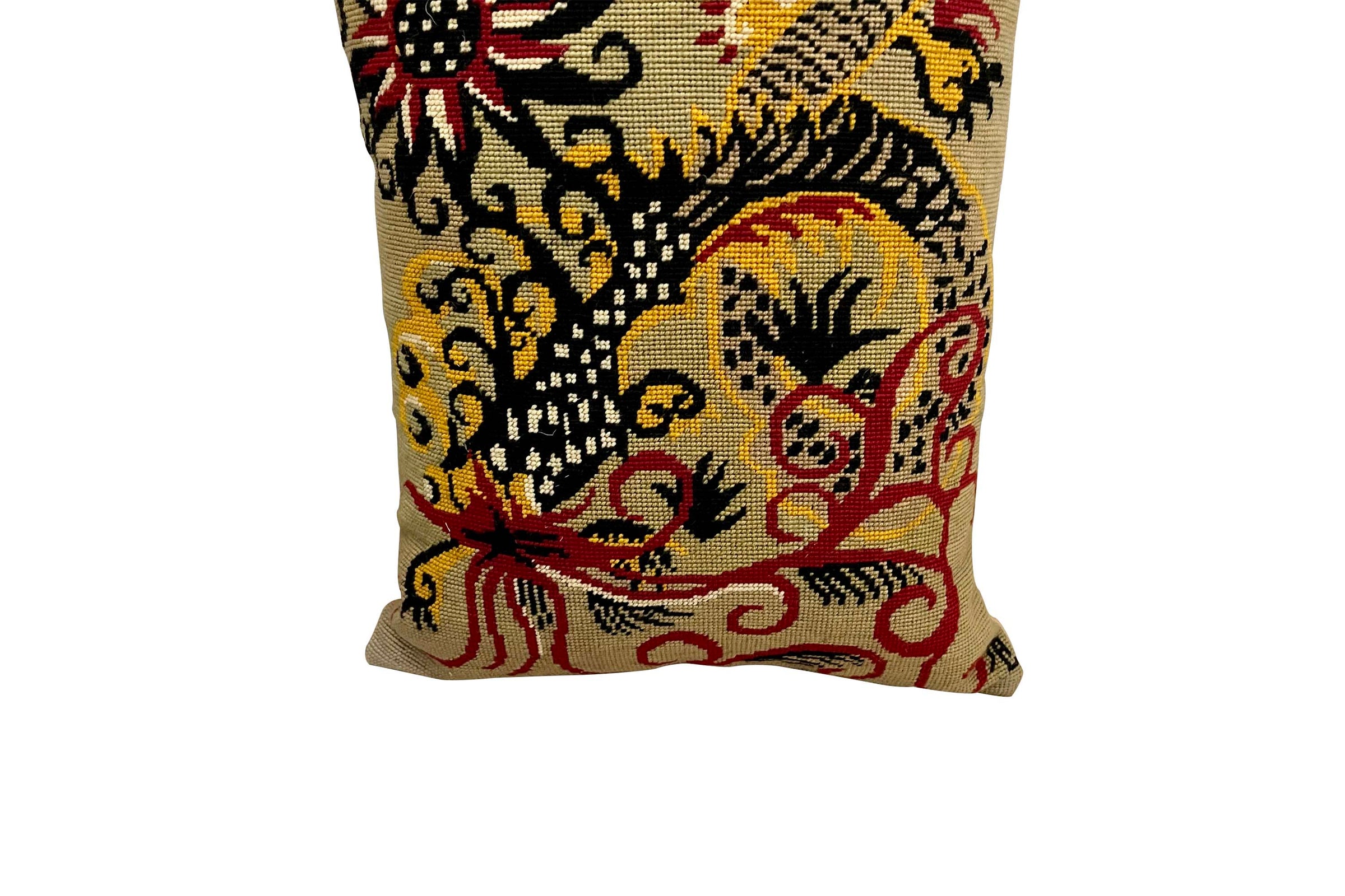 Mid-Century French wool needlepoint cushion featuring a striking stylised dragon or phoenix in red, black, cream, and golden tones.