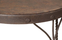 An elegant set of four mid-20th Century French wrought-iron folding chairs of the 'Bouchon de Champagne' type.