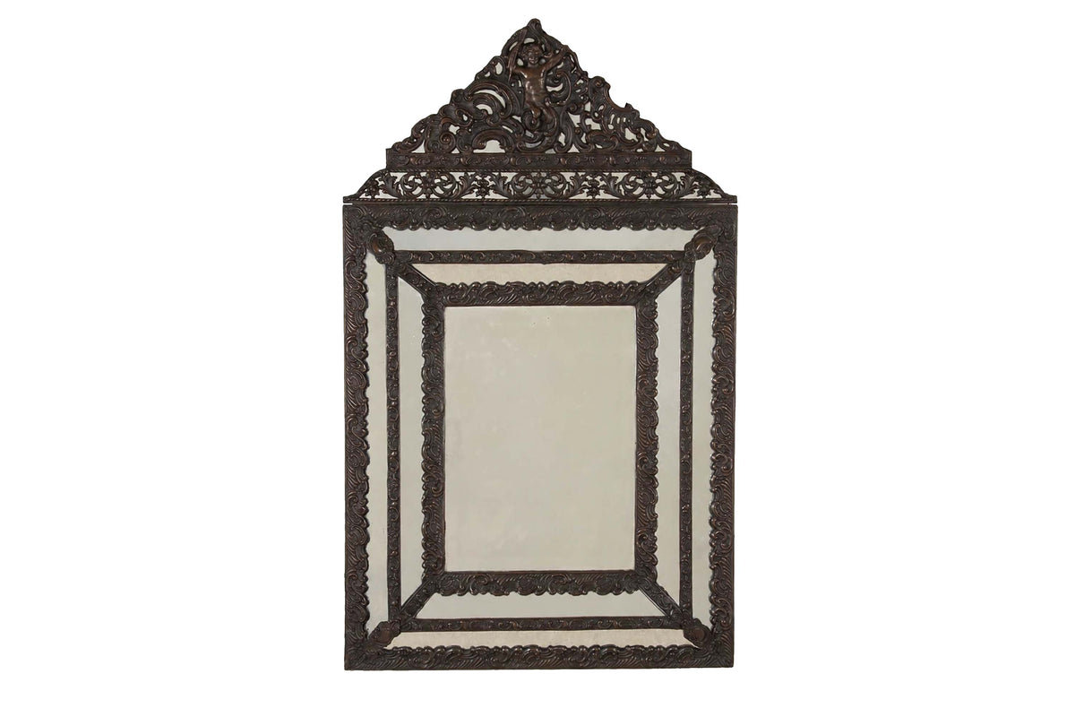 Early 20th Century French Repoussé Brass Cushion Mirror with Cupid Crest
