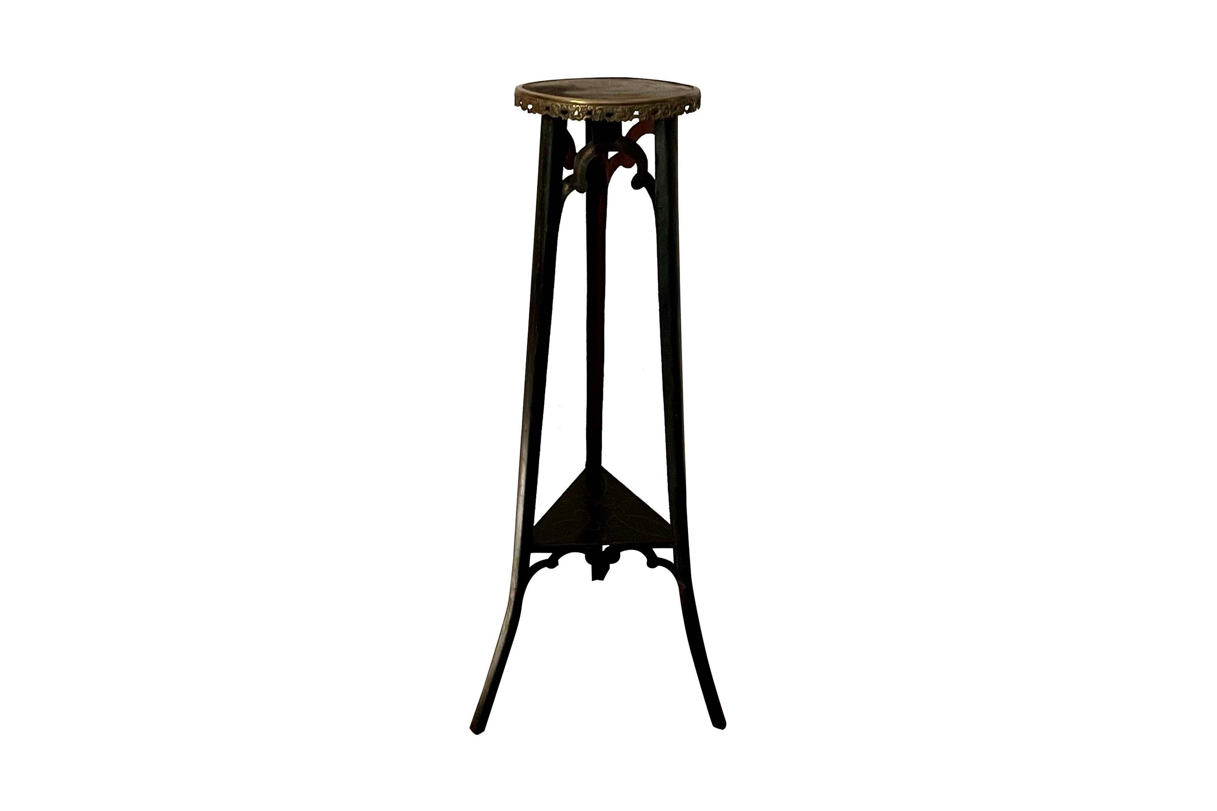 An unusual and highly decorative French Napoleon III pedestal stand in black lacquered tôle peinte, dating to the late 19th century.