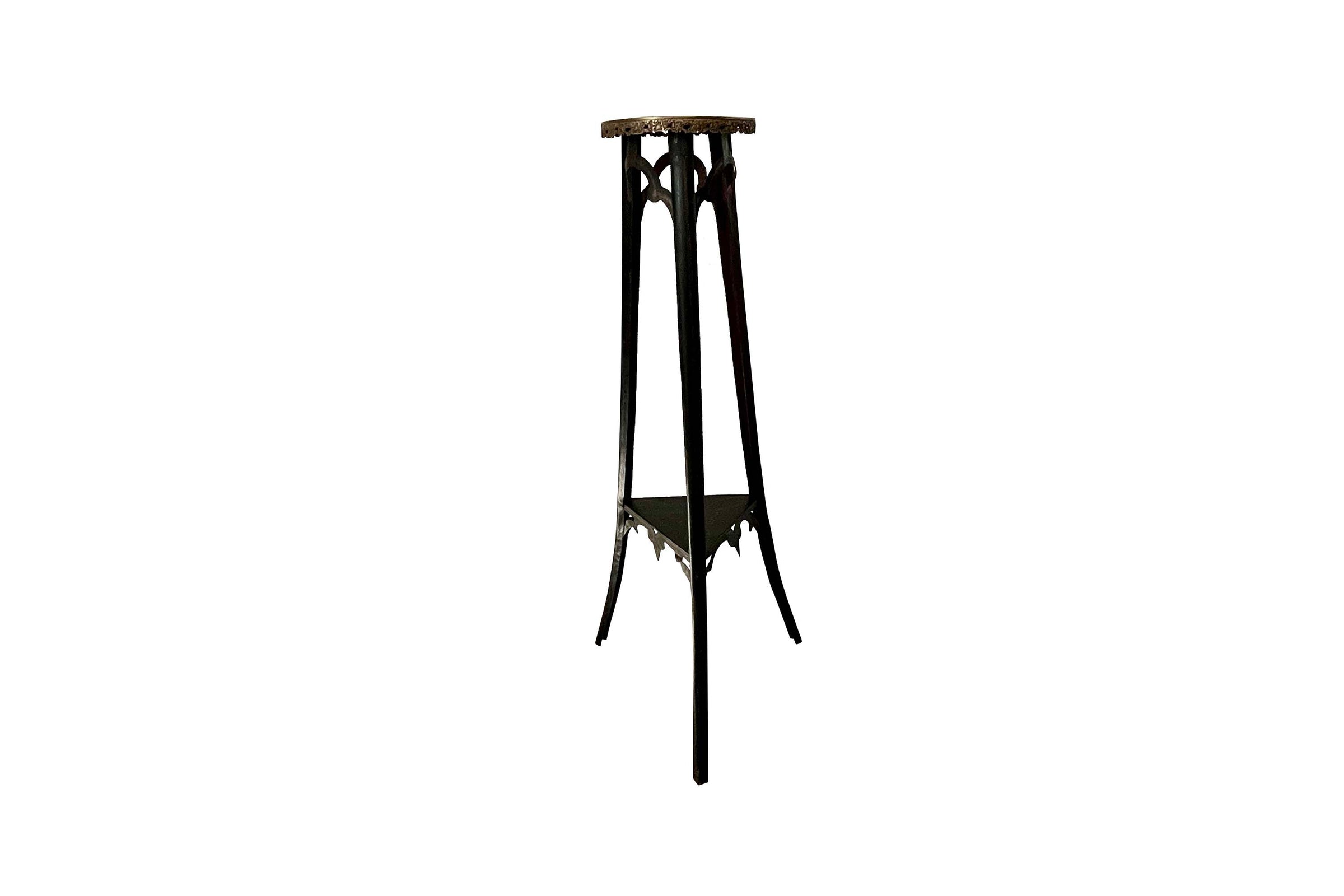 An unusual and highly decorative French Napoleon III pedestal stand in black lacquered tôle peinte, dating to the late 19th century.