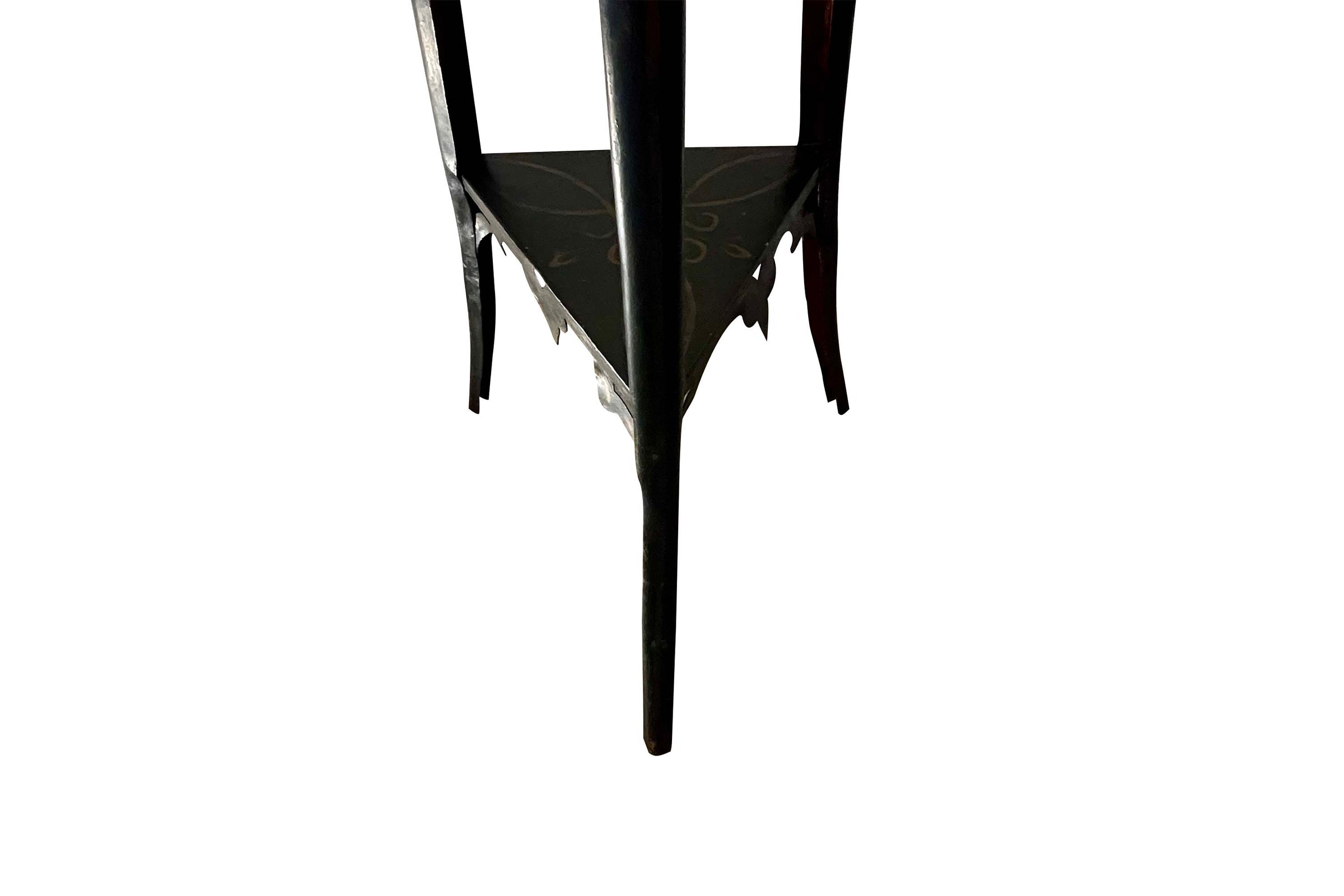 An unusual and highly decorative French Napoleon III pedestal stand in black lacquered tôle peinte, dating to the late 19th century.