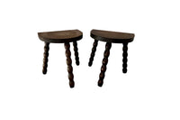 PAIR OF 20TH CENTURY FRENCH BOBBIN MILKING STOOLS