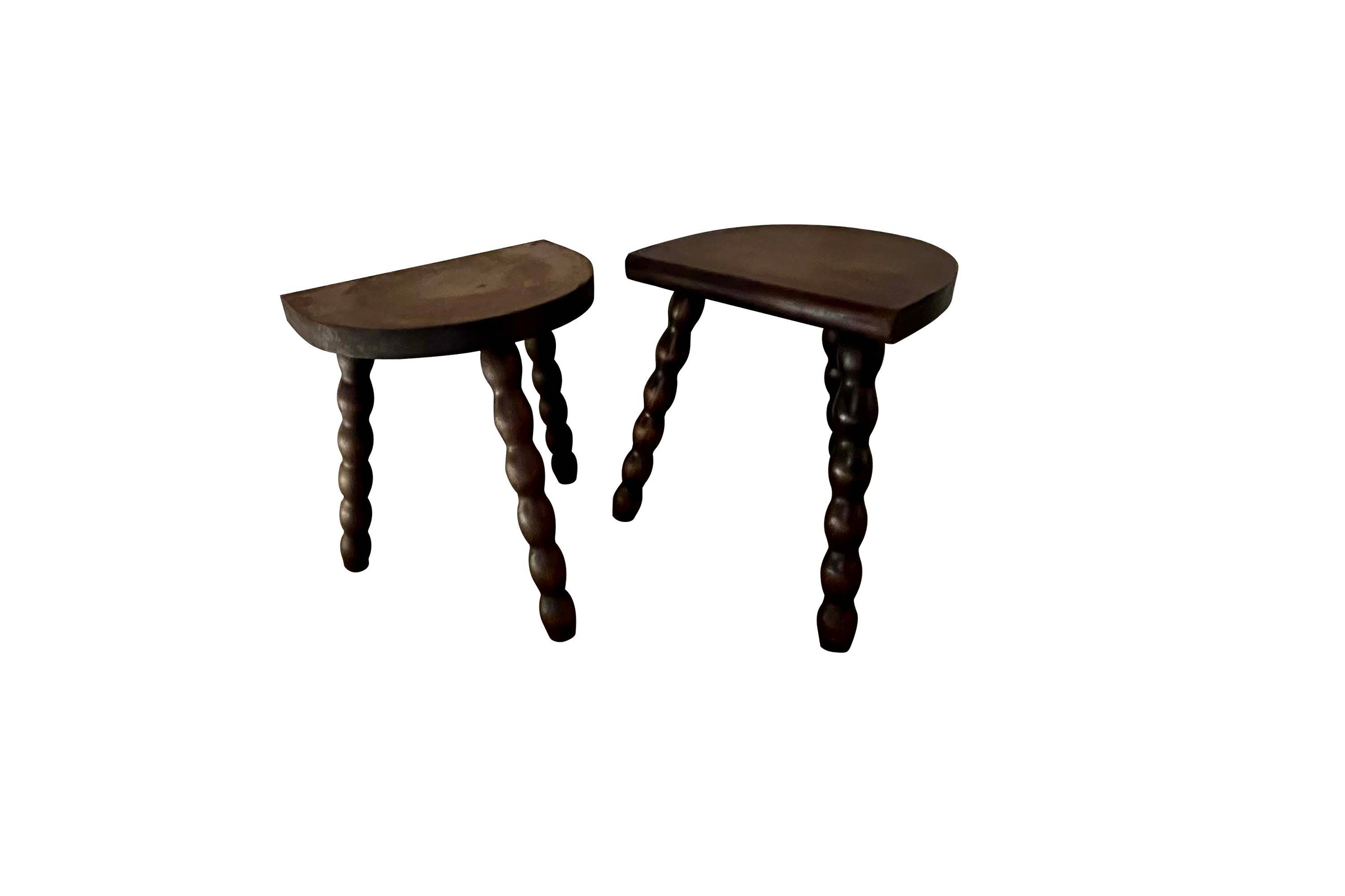 PAIR OF 20TH CENTURY FRENCH BOBBIN MILKING STOOLS