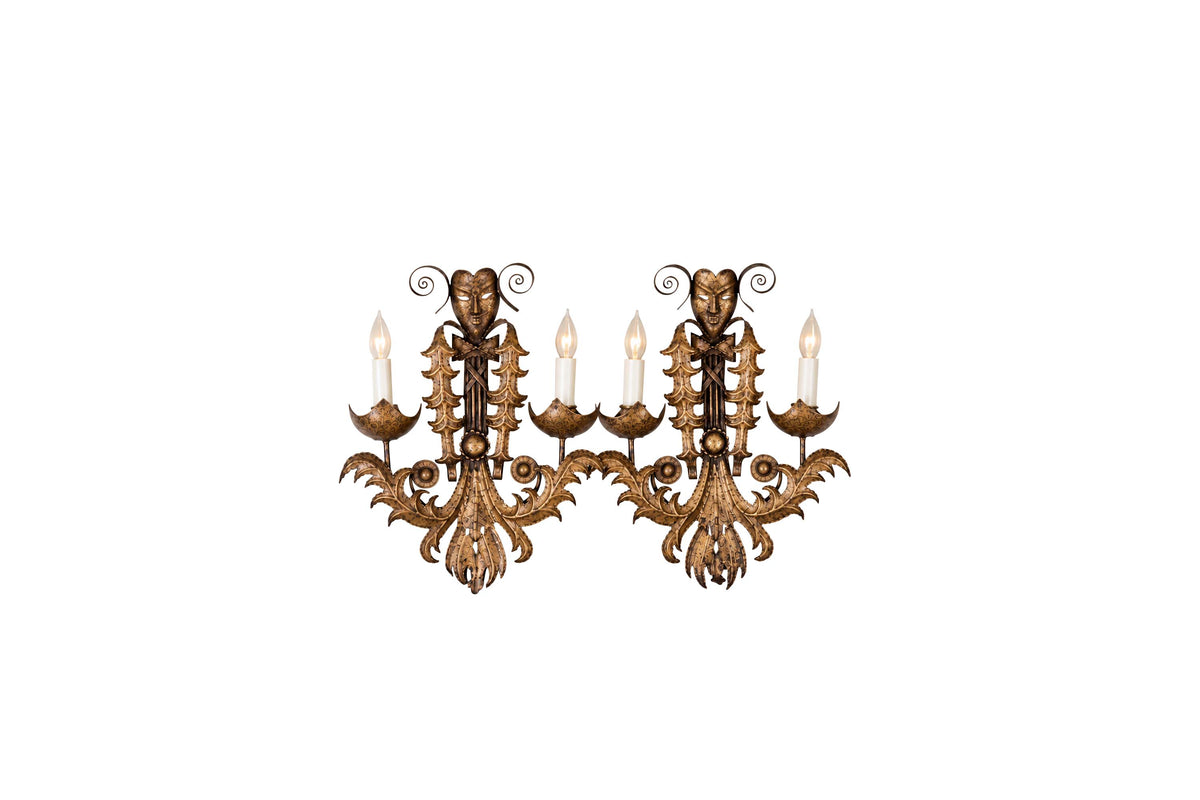 pair of Pair of Mid-Century Italian wrought iron wall lights in the Italian manner, inspired by Commedia dell’Arte.