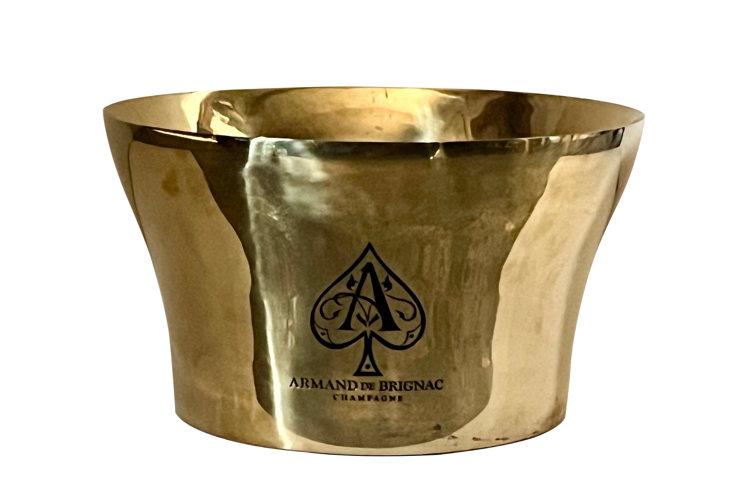 An enormous 'Armand De Brignac' champagne bath in double walled stainless steel with a gold colour finish and deeply embossed ace of spades. 

