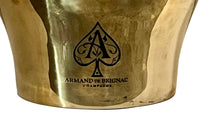 An enormous 'Armand De Brignac' champagne bath in double walled stainless steel with a gold colour finish and deeply embossed ace of spades. 

