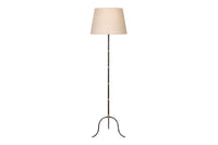 Mid-Century French black metal and brass floor lamp with elegant tripod base and restrained neoclassical styling.