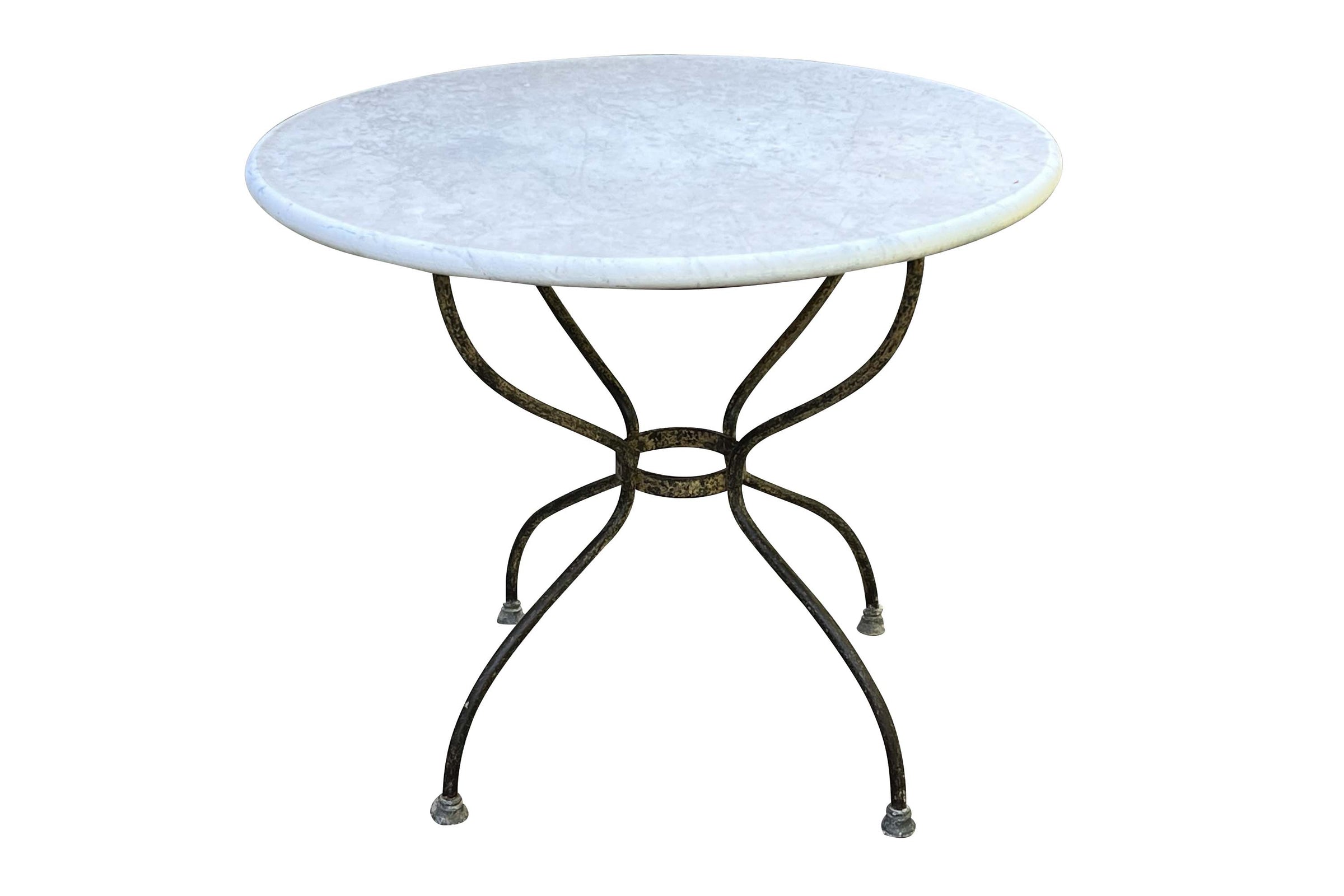 Large late 19th  Century French wrought round iron guéridon table with marble top.