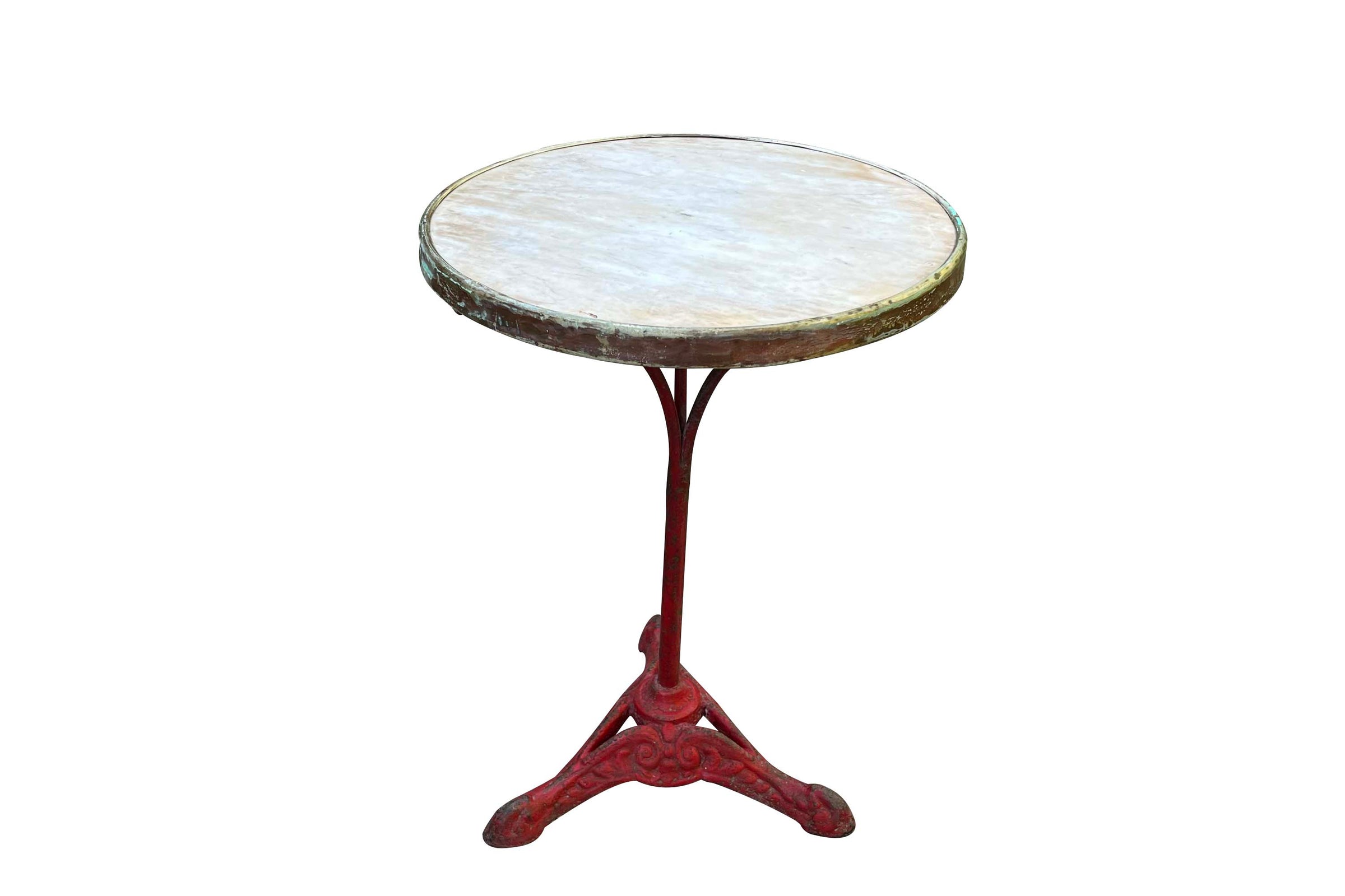 A charming late 19th Century French guéridon or café table, retaining its original cast iron tripod base with scrolling decoration and lovely classic cafe-red painted finish.