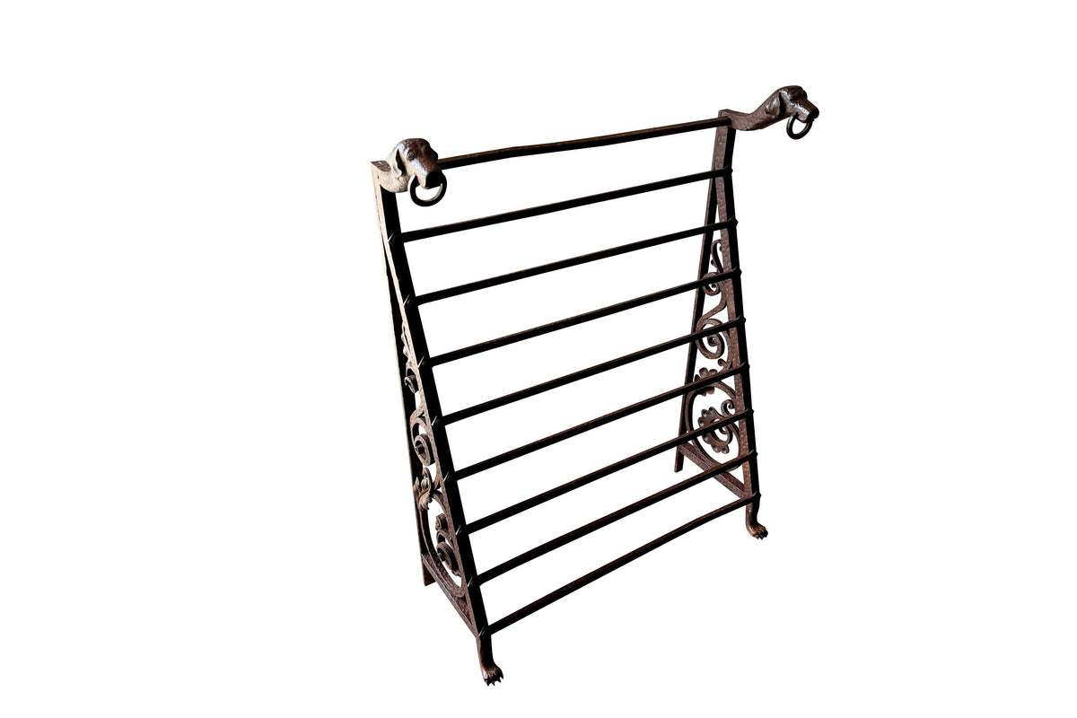 Late 19th Century French wrought iron fire front hearth boot and shoe drying rack with dog motifs