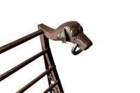 Late 19th Century French wrought iron fire front hearth boot and shoe drying rack with dog motifs